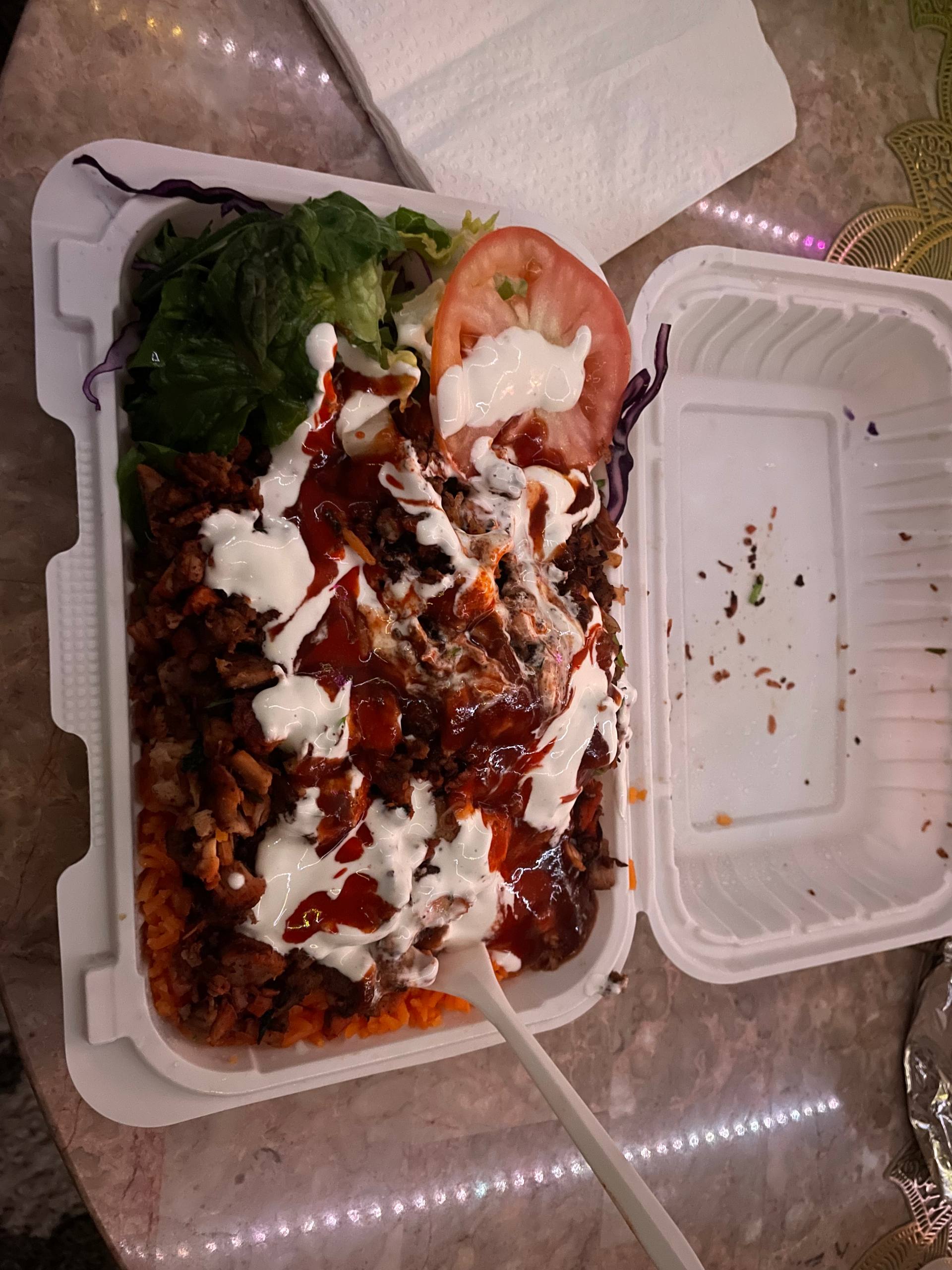 Loaded rice bowl with meat and sauces