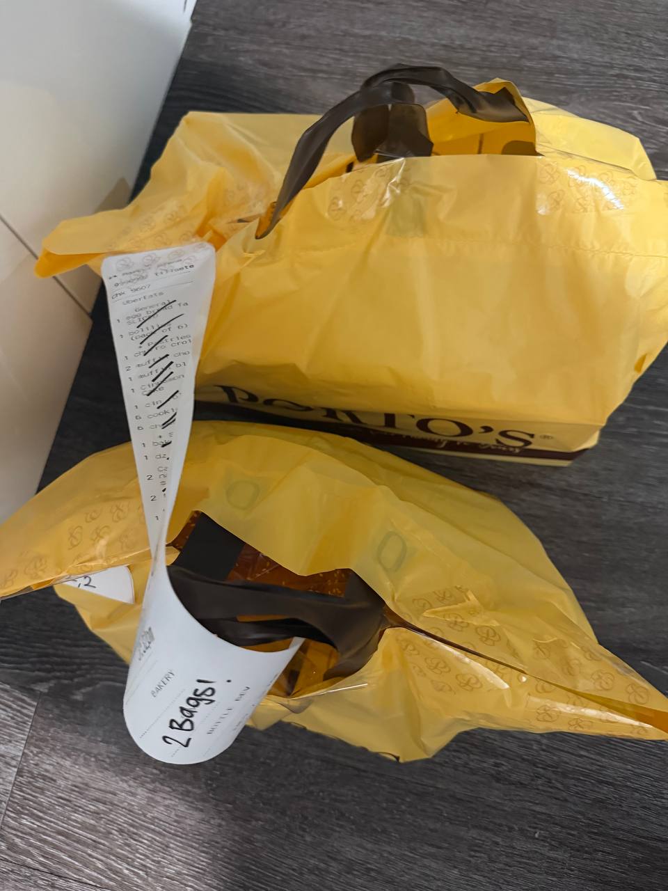 Porto's Bakery yellow delivery bags